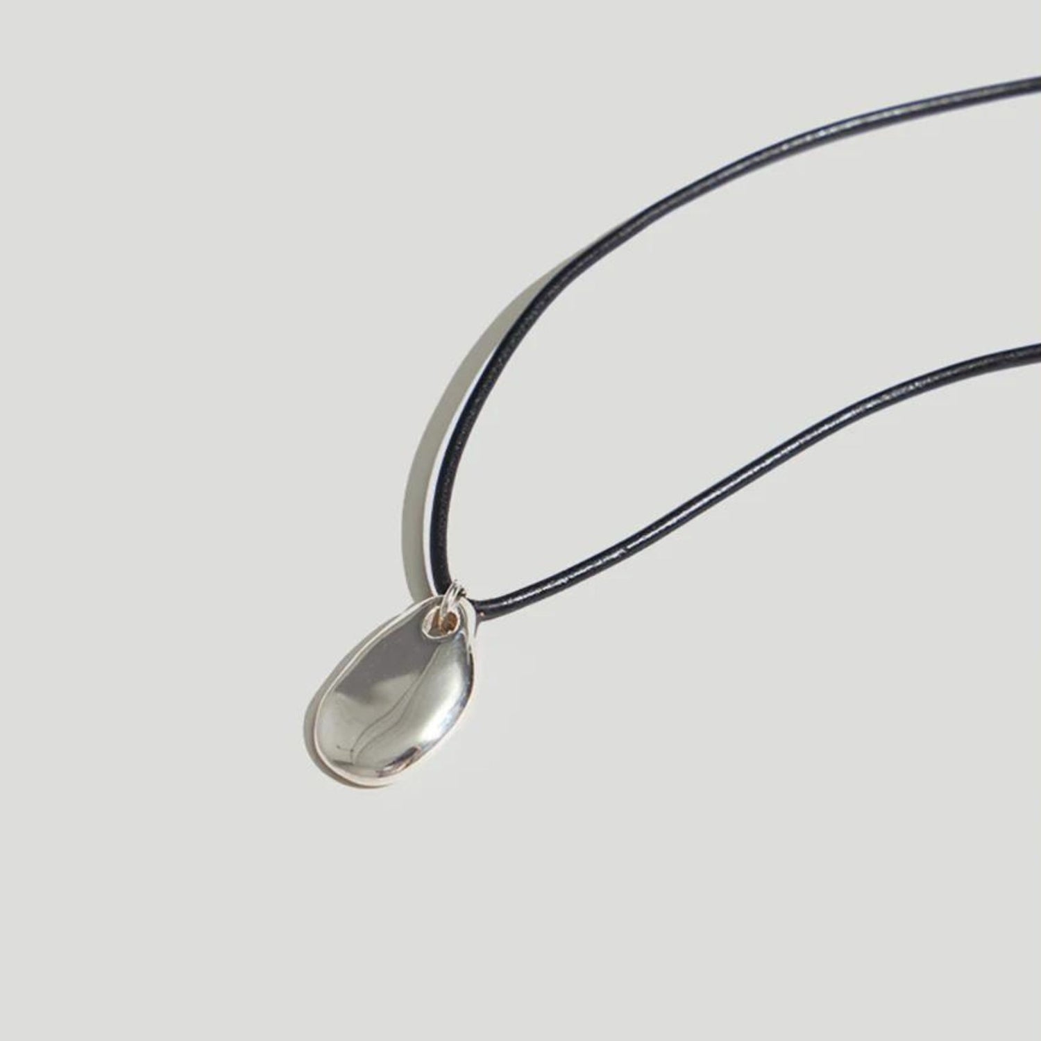 Small Pebble Pendant Necklace Silver Cord